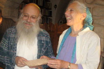 Reuven and Yehudit Goldfarb Breaking Matzah